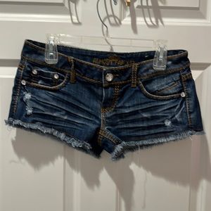 Almost Famous rhinestone Jean shorts juniors size 5.